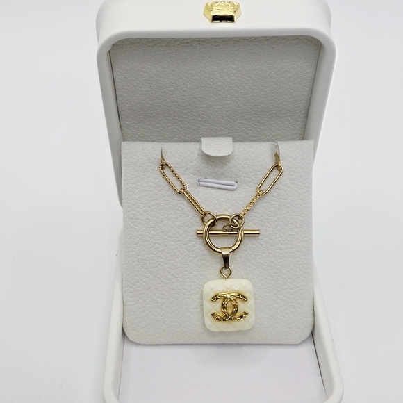 Authentic CHANEL Gold and Cream Logo Necklace. On Atolea Waterproof Chain - Picture 2 of 6